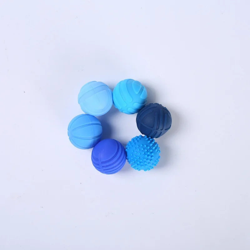 Juguete sensrorial con forma de bolas de silicona azules | Neuromart