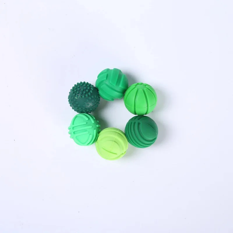 Juguete sensorial con forma de bolas de silicona verdes | Neuromart