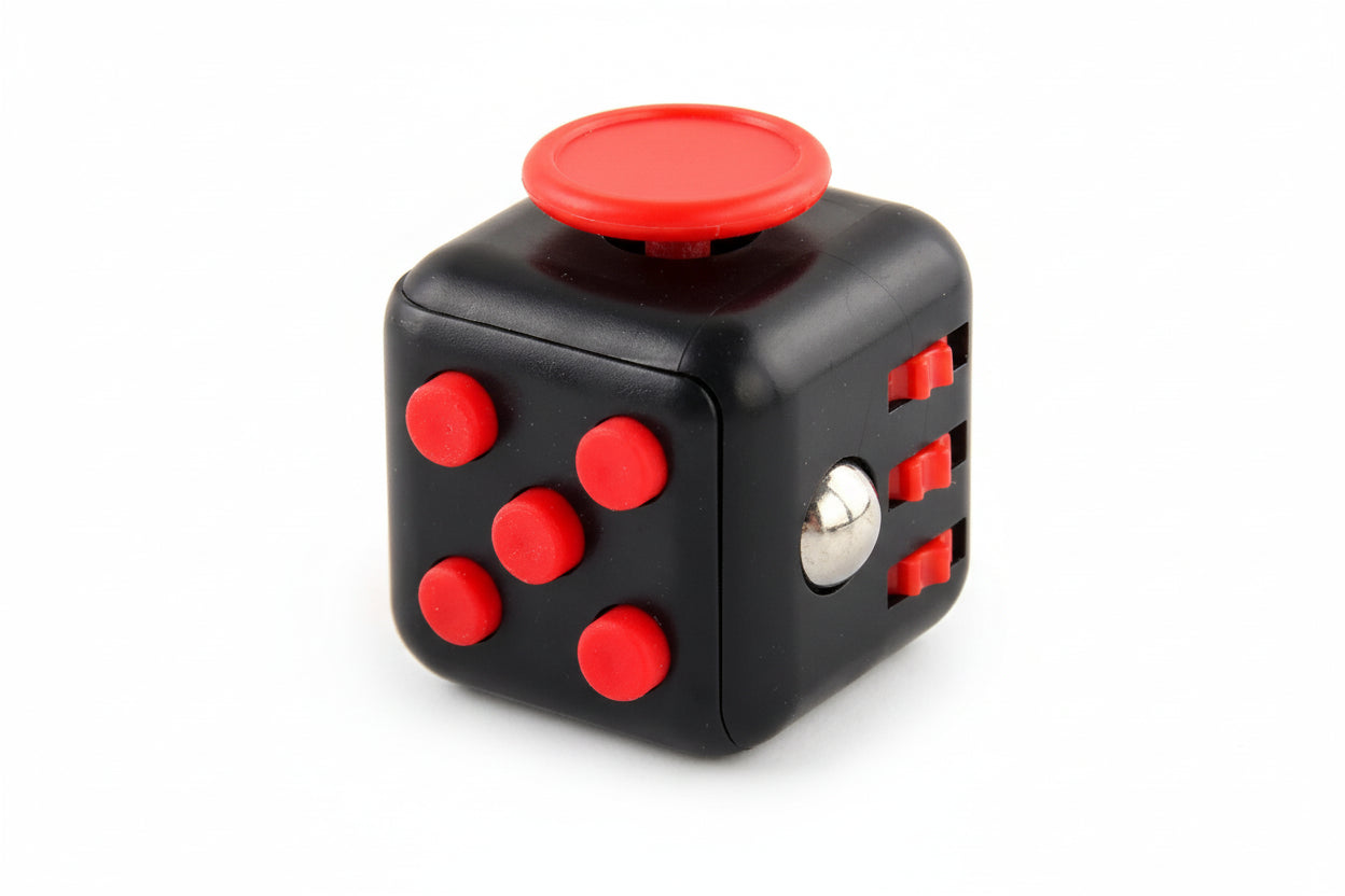 Juguete senorial tipo fidget con forma de dado negro y rojo | Neuromart