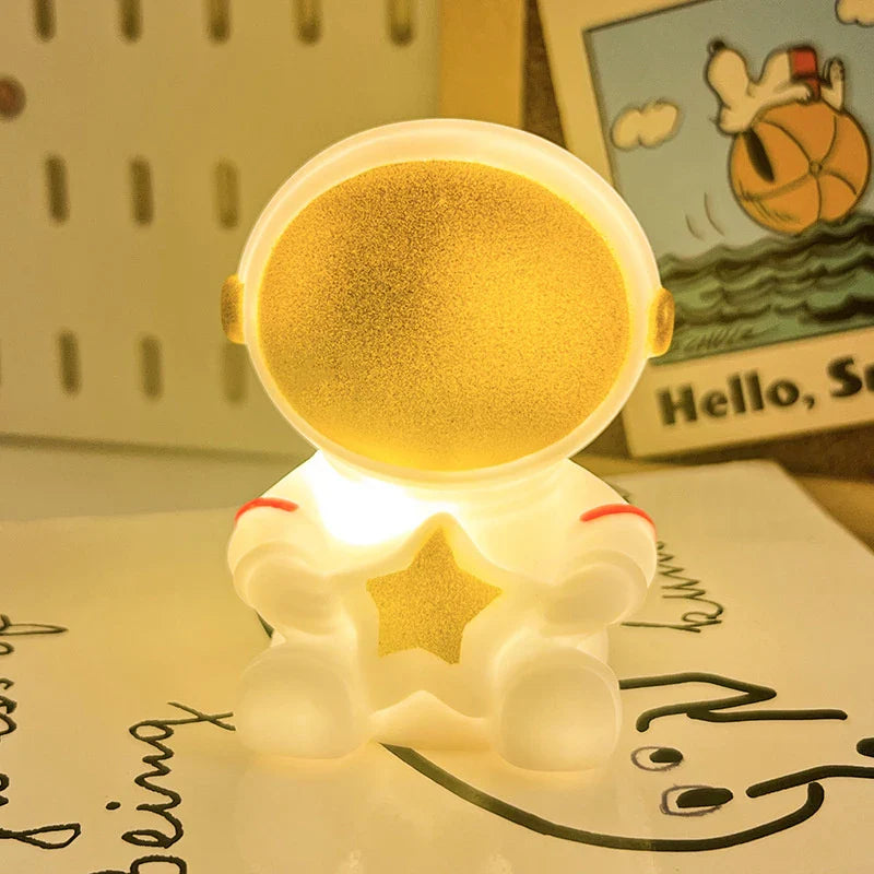 Lámpara LED nocturna con diseño de astronauta con mano | Neuromart