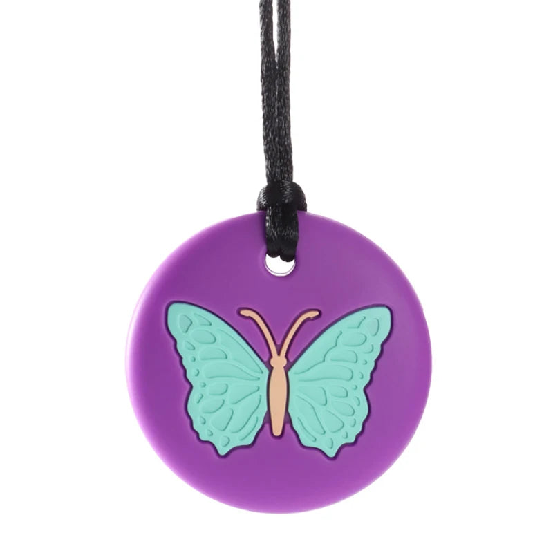 Colgante mordedor con forma de mariposa - en uso | Neuromart