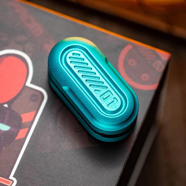 Fidget slider Green Pod material metálico | Neuromart