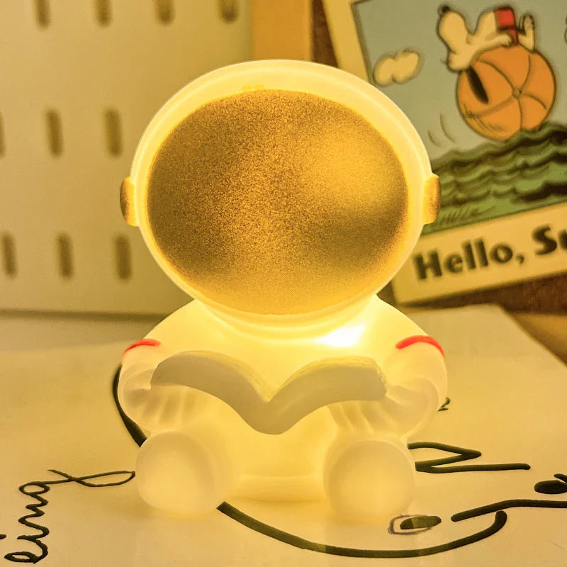Lámpara LED nocturna con diseño de astronauta color amarillo | Neuromart